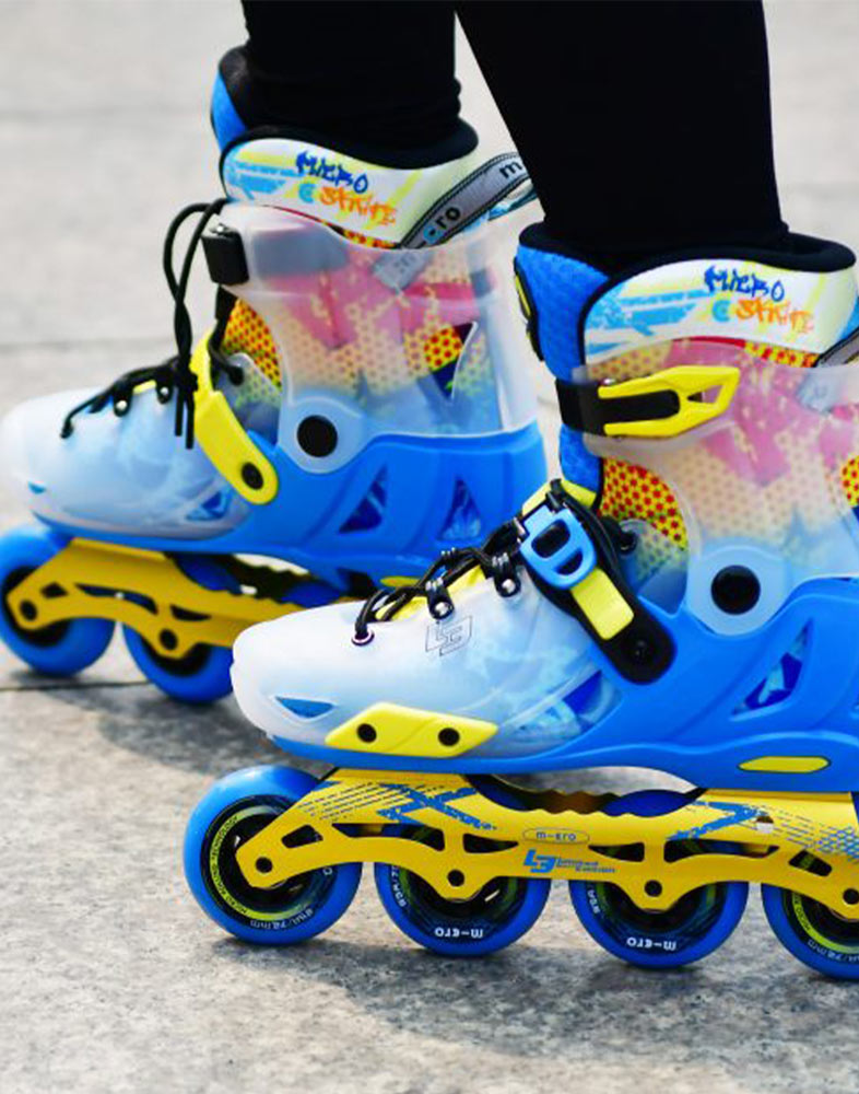 side view of blue infinite limited edition skates on