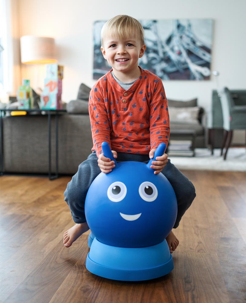toddler on their inflatable ride on air hopper