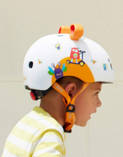kid wearing a monster 3d kids helmet