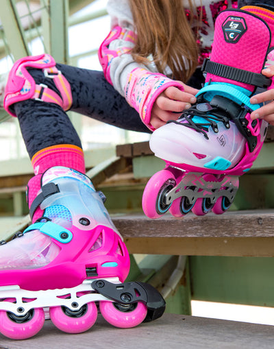 lifestyle image of girl putting limited edition infinite skates on
